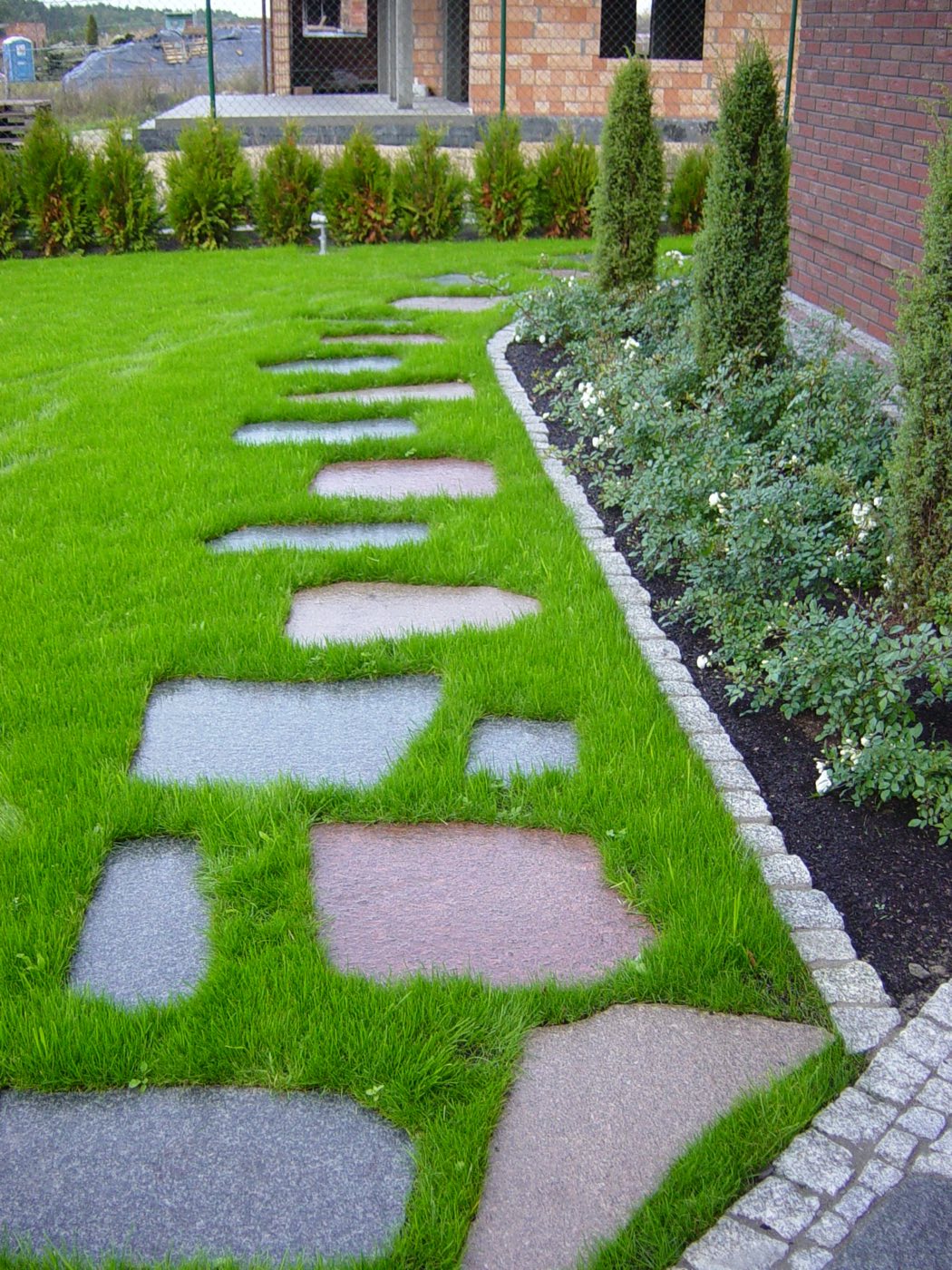 Project: An informal path in the lawn made of polygonal pavers