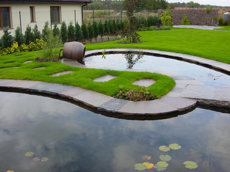 Project: A pond and swimming pool finished with Oflis granite slabs